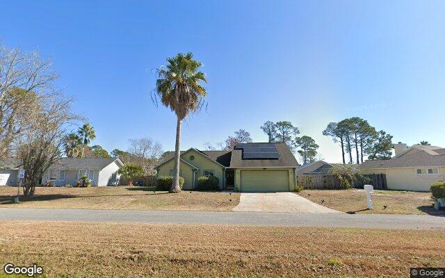 Street view of 302 Fan Palm Pl