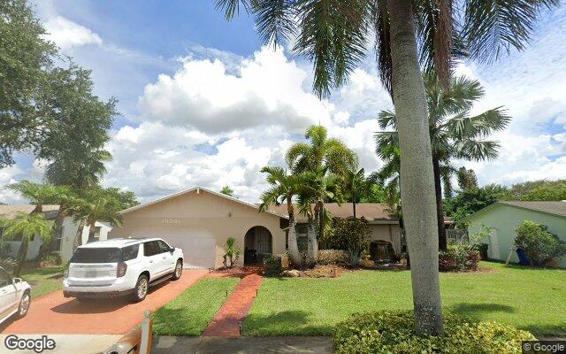 Street view of 10961 NW 16 Ct