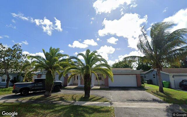 Street view of 7040 NW 21 Ct