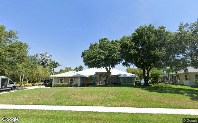 Street view of 5530 SW Orchid Bay Dr